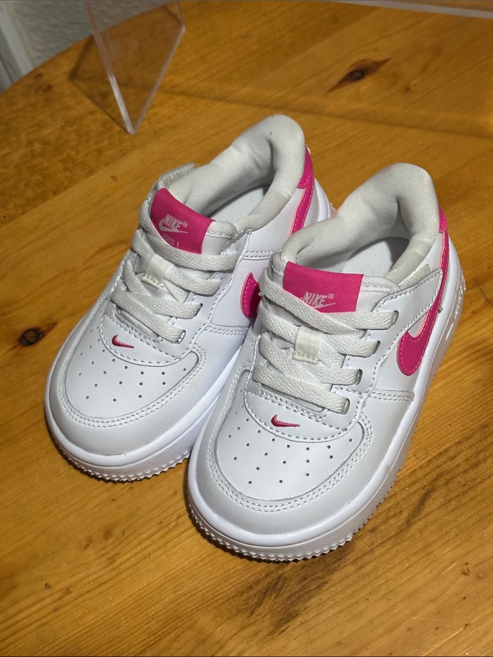 Nike Kids White Sneakers with Pink Swoosh 7C